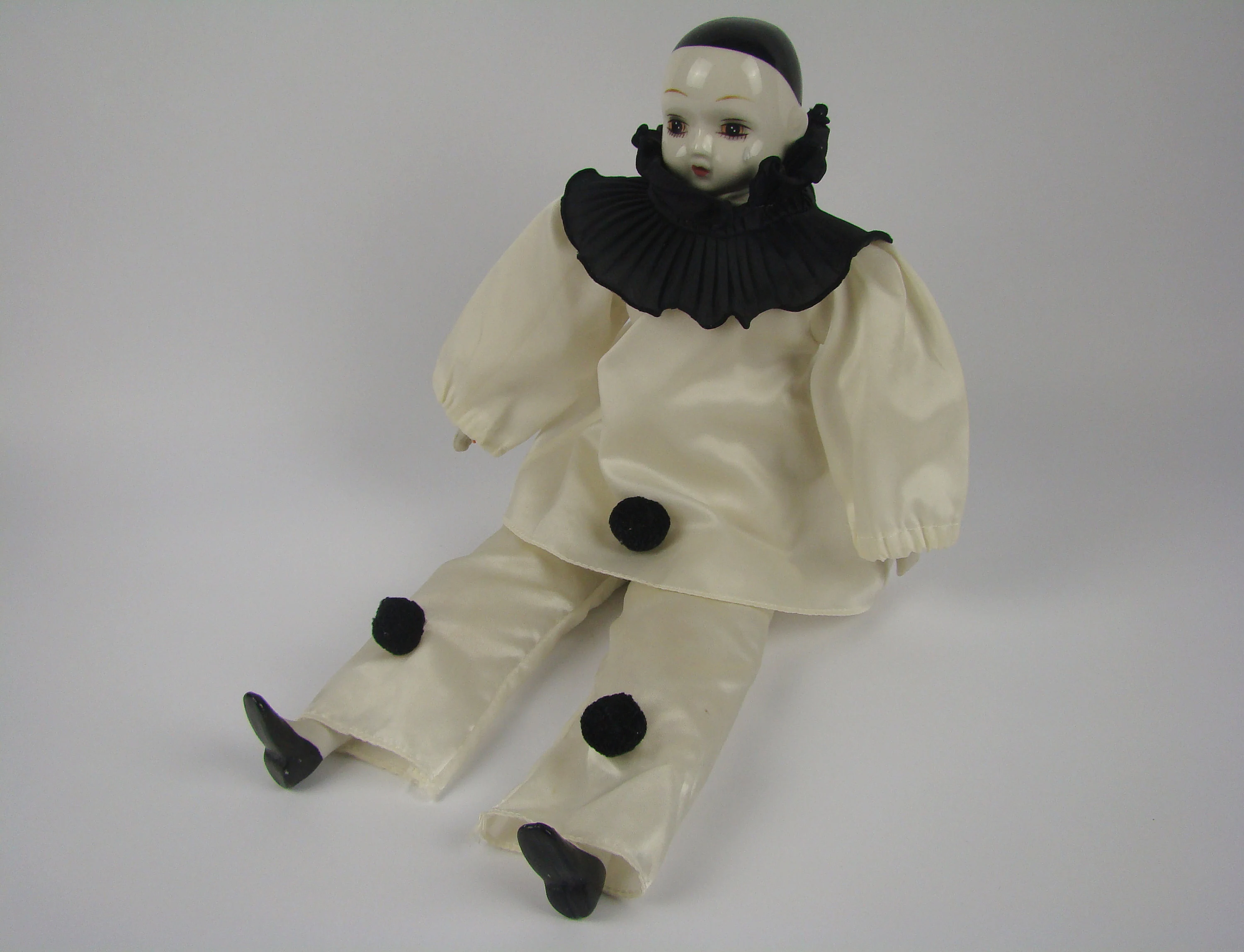 a photo of a pierrot clown doll