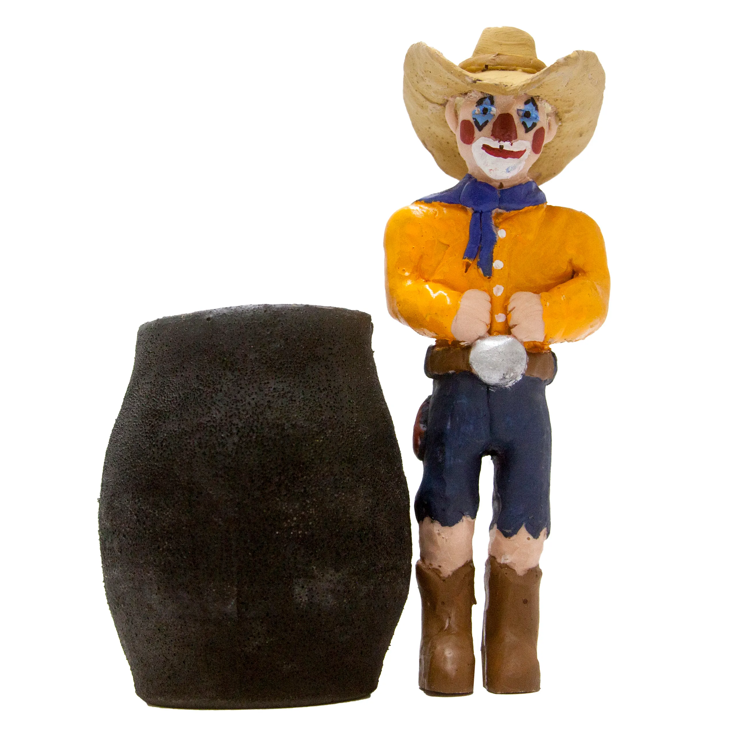 a photo of a rodeo clown doll with a black barrel
